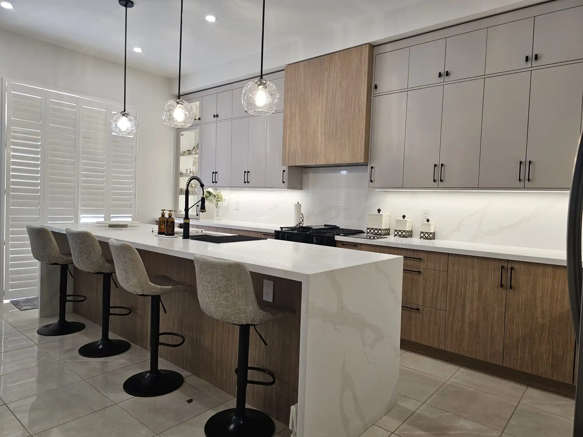 Kitchen island and finishes by Pine Kitchen Design Inc.
